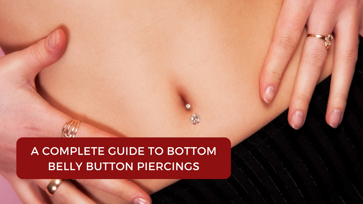 close uo of female model wearing bottom belly piercing