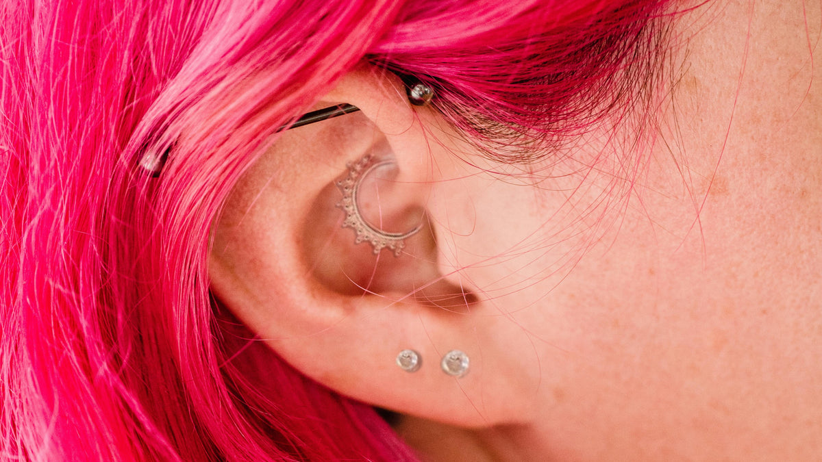 Combining Industrial Piercings with Other  Ear Piercings for a Unique Look