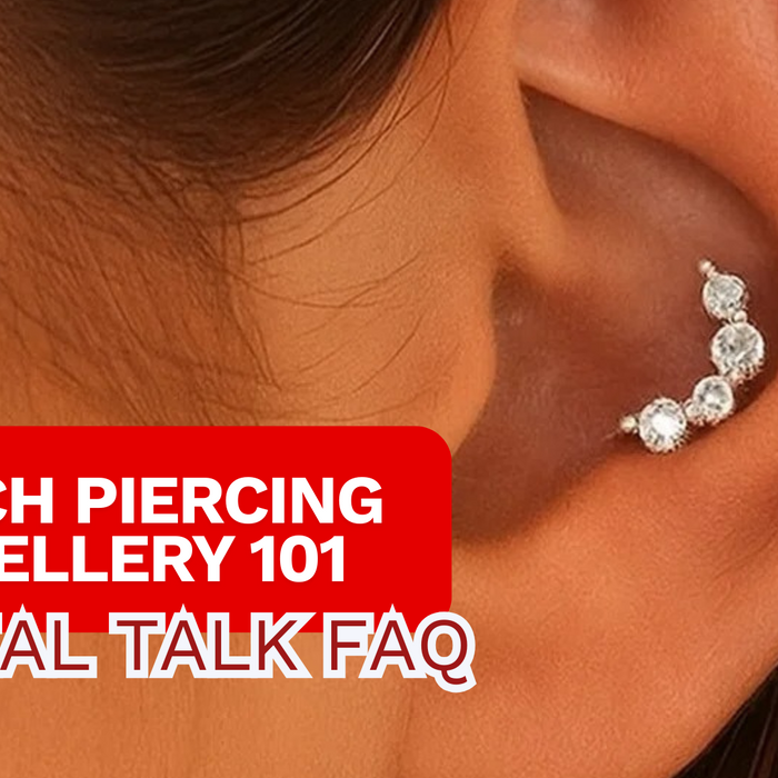 close up of female model wearing conch piercing that is a flat back with gems