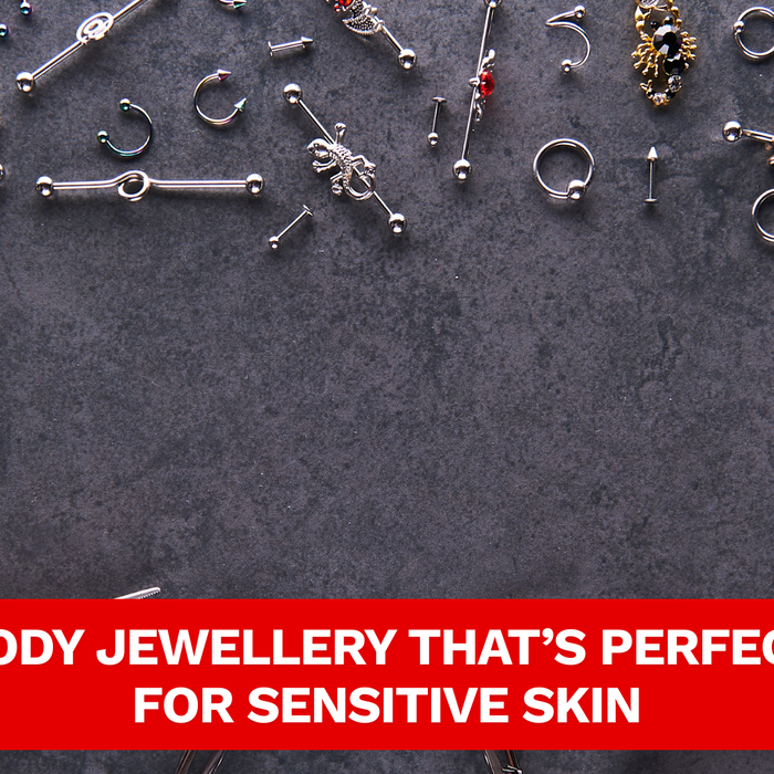 Display of premium piercing jewelry with multiple piercings lying on the surface