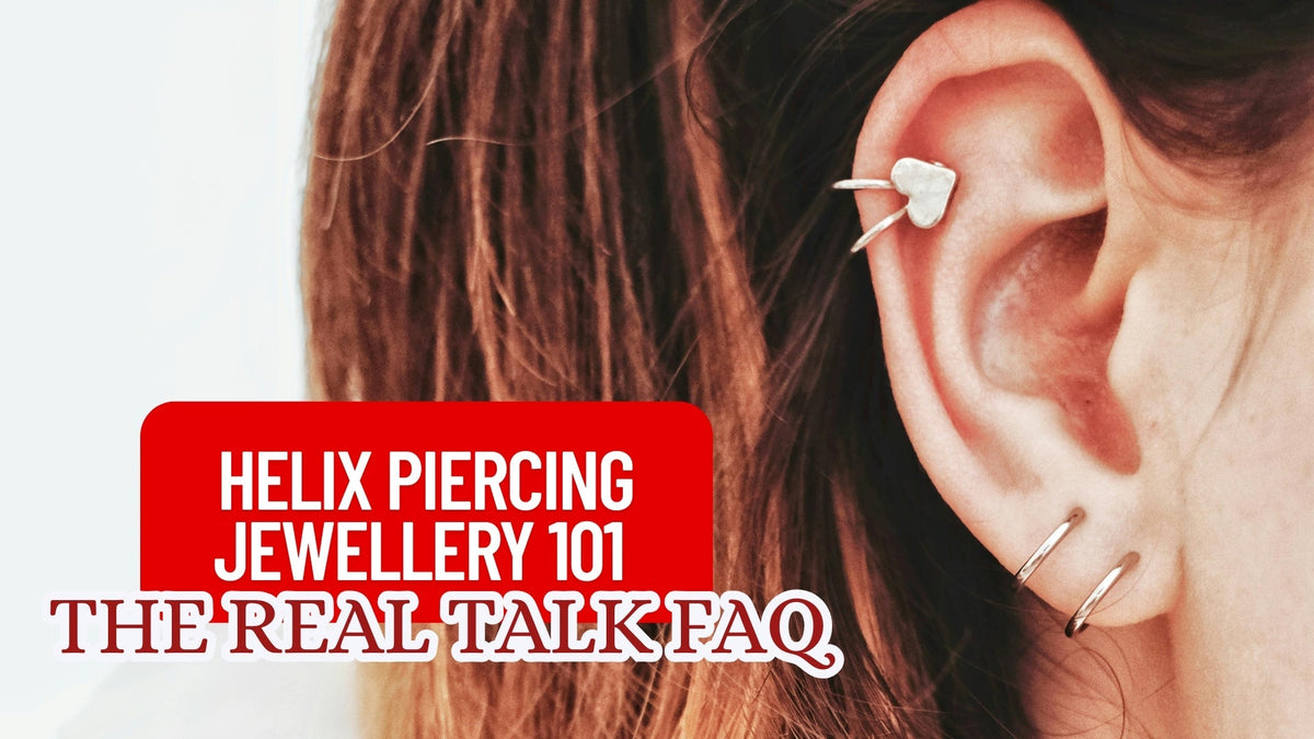 Close-up of a silver hoop helix piercing on a woman's ear.