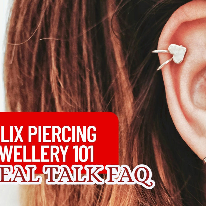 Close-up of a silver hoop helix piercing on a woman's ear.