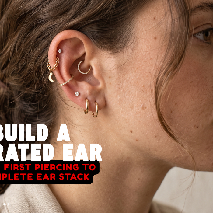 Model wearing a curated ear stack with gold hoops, cartilage studs and multiple lobe piercings