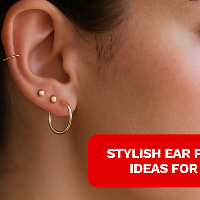 close up of a model wearing lobe piercing, upper lobe piercing and helix piercing