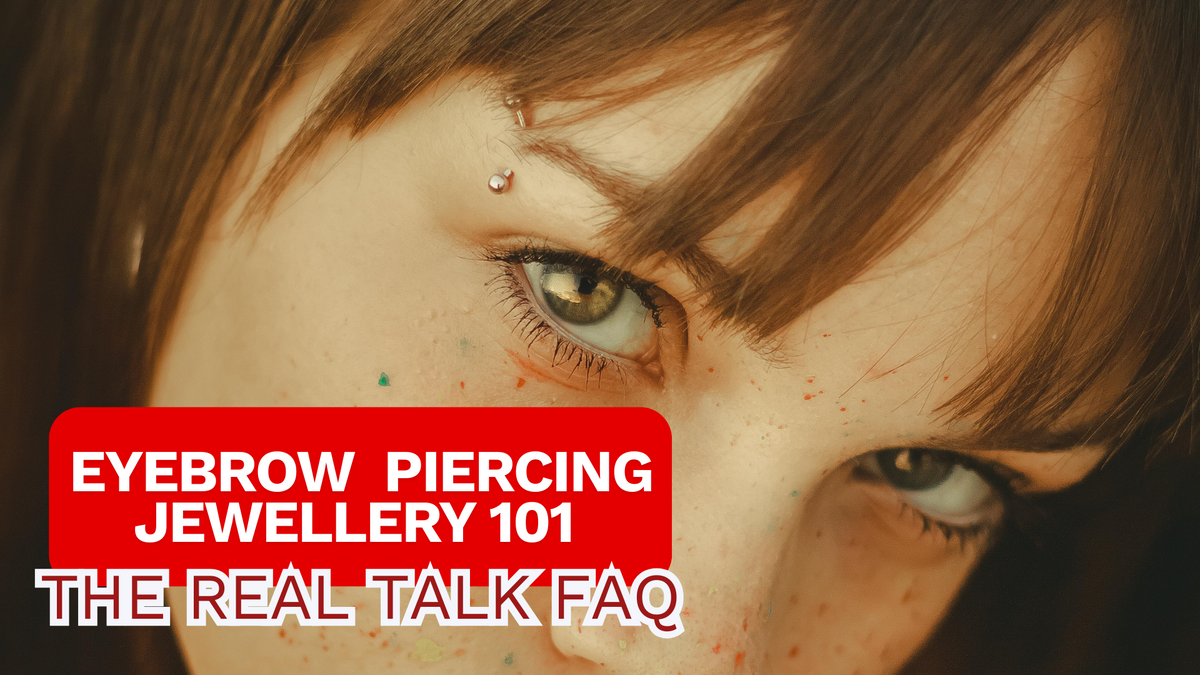 close up of eyebrow piercing worn by a female mode. The piercing is a curved barbell