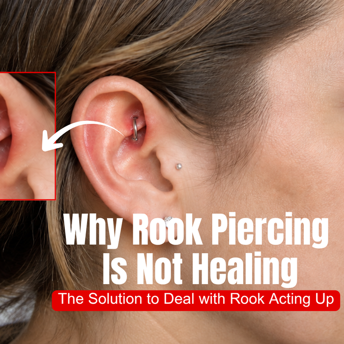 Close-up of a rook ear piercing fitted with a curved barbell
