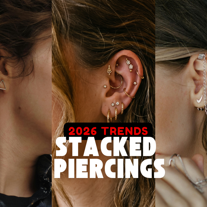 3 females with ear close up showing fully curated ear with helix piercing, lobe piercing, rook piercing, daith piercing and conch piercing