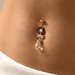14K Gold Jewelled Dangling Bow Belly Ring worn on skin
