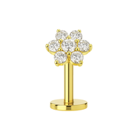 G23 titanium CZ jewelled flower threadless floating belly ring in gold with sparkling crystal petals, ideal for hypoallergenic body piercings.