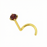Gold nose screw with garnet stone