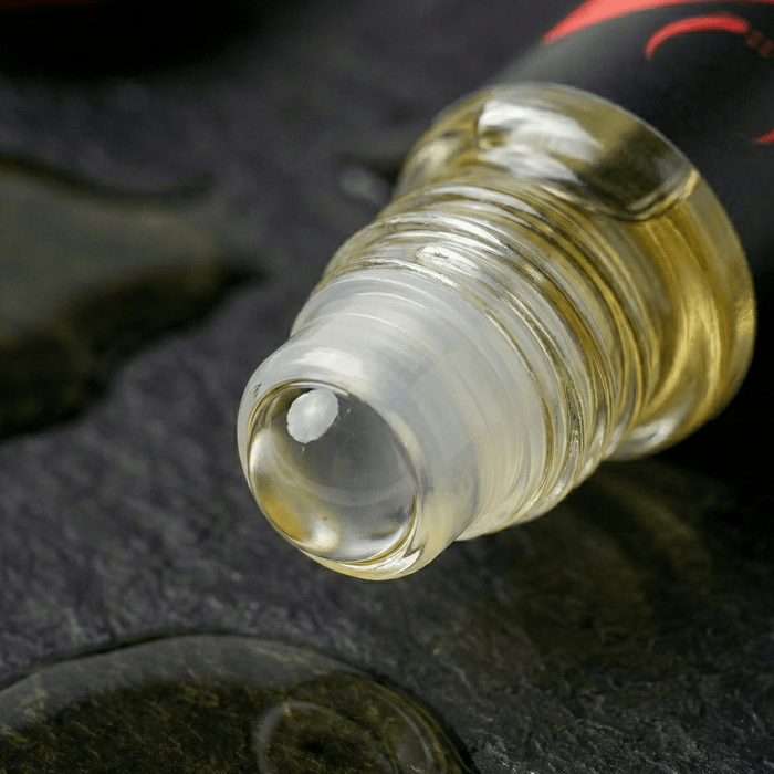 Close-up of jojoba healing oil roll-on applicator