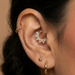 Close-up of CZ Diamond Septum Clicker Jewelry on Ear