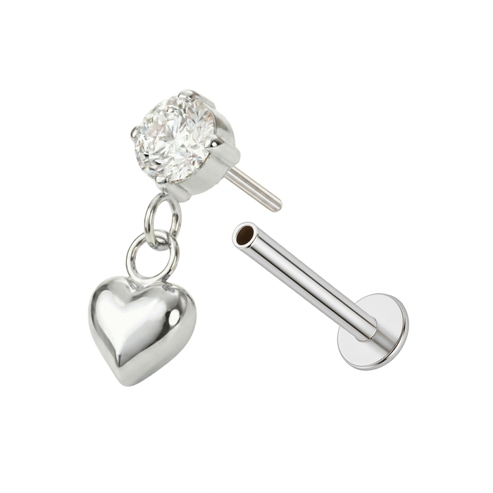 Disassembled silver DANGLING HEART CZ stud showing push-fit flat back and implant-grade G23 titanium construction for comfort.